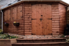 di-dais-garden-log-lap-building-c