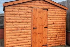 Log-Lap-Apex-Shed-with-single-door-treated-red-cedar-33
